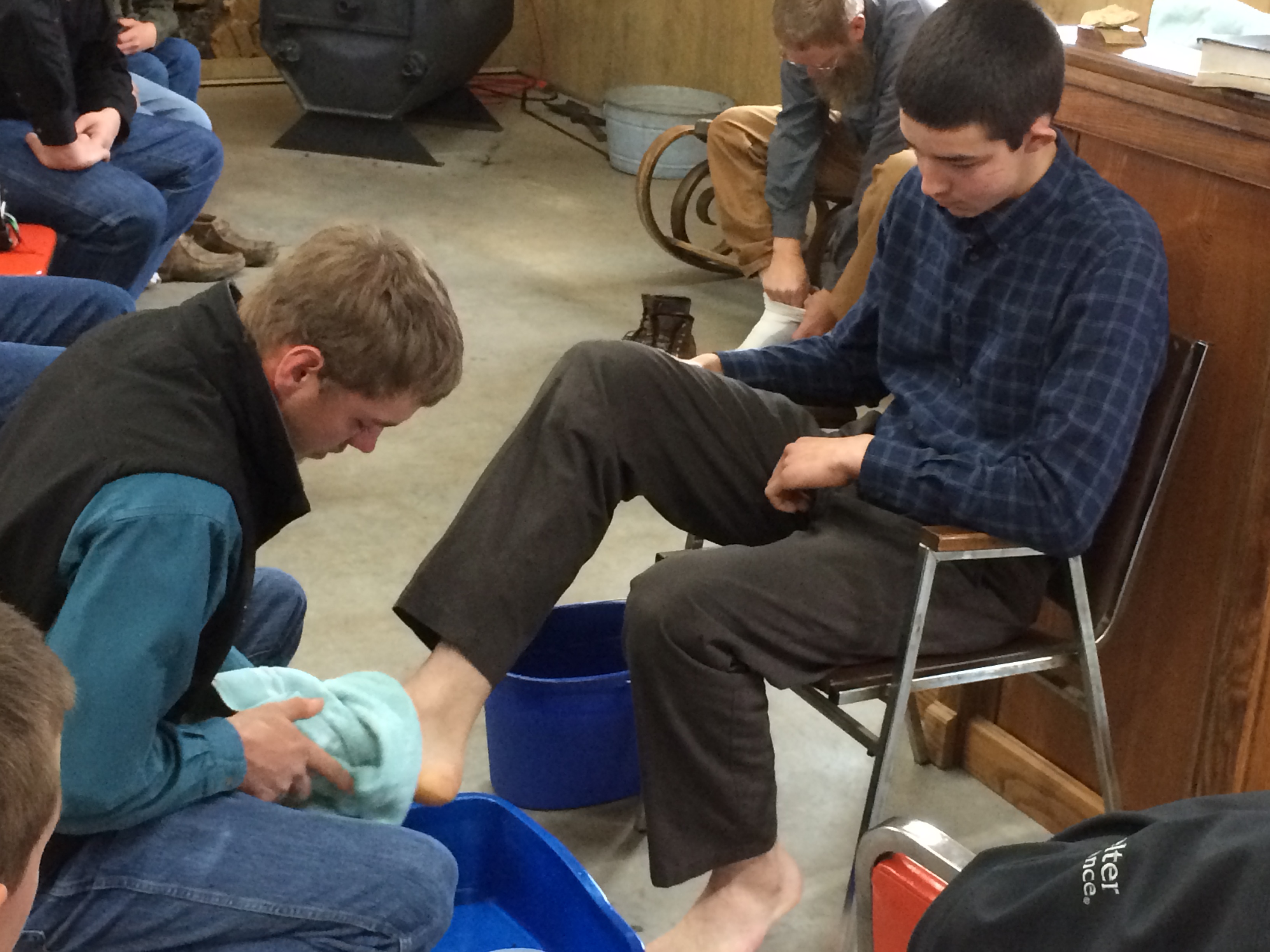 Young Men Foot washing